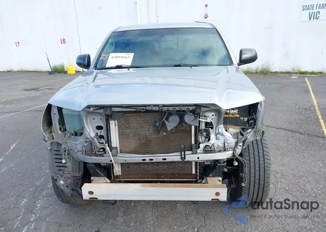 2014 Toyota Tacoma Base V6 z USA, uszkodzony, nr VIN 3TMLU4ENXEM162347